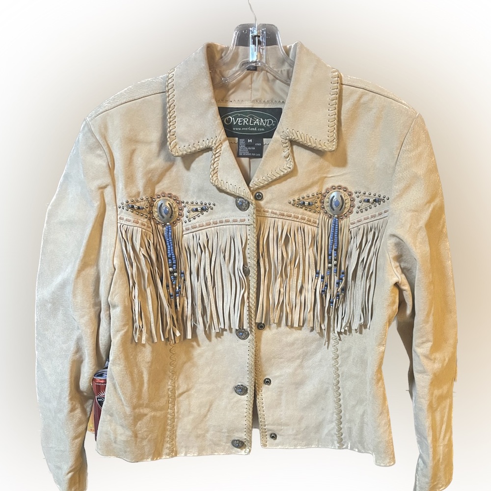 Blonde/tan suede jacket w fringe, embellished w silver & turquoise pieces.